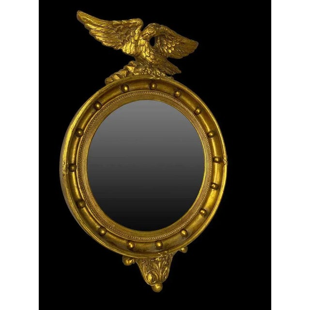 19th century oval mirror of napoleon iii period. Carved wood, covered with gold leaf finish. This piece has beautiful...