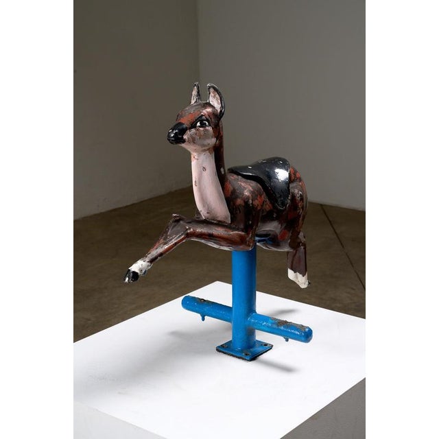 This vintage cast aluminum carousel deer figure is a charming and distinctive piece of mid-century industrial folk art....
