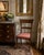 This striking armless side chair is a fine example of late 19th century Dutch craftsmanship, featuring an elegant Regency-...