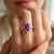 Radiant Emerald-Cut Amethyst Statement Ring Discover the timeless elegance of this beautifully crafted ring .This piece...
