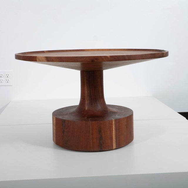 Solid acacia turned wood coffee table.