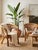 Bring an effortless touch of organic modern texture to your space with this stunning pair of vintage mid-century rattan...