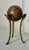 A mediterranean classical Greek style is displayed in this unique piece. A solid marble orb sphere in warm sienna brown,...