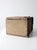 This vintage wooden storage box features a timeworn patina with faded paint and aged wood, giving it a rustic, well-loved...