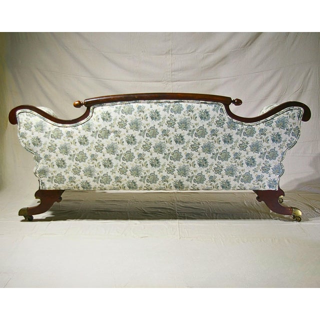 Description: A magnificent second-quarter 19th-century Maritime Canadian Grecian Empire "sopha" or settee, heavily...