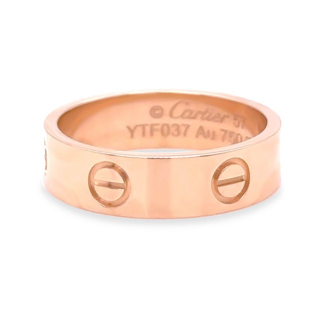 A timeless Cartier LOVE ring crafted in 18ct yellow gold, featuring the Maison’s iconic screw motif that has become an...