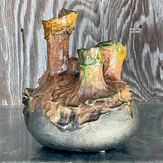 Elevate your home decor with this stunning Vintage Boho Studio Pottery Tri-Tube Vase. This unique piece showcases a blend...