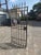 This majestic wrought iron gate, dating back to the early 20th century, perfectly embodies the charm of antique outdoor...
