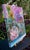 In A World Of My Own by Amanda Seckington | Acrylic on canvas woman surrounded by flowers and foliage For Sale - Image 4 of 4