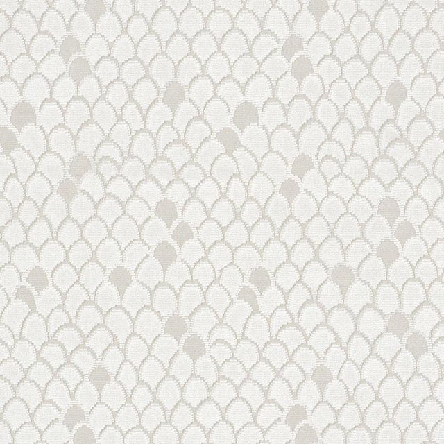 Named after Esther Williams, this elegant fish scale design makes a subtle splash. Tonal variations and shimmery filament...