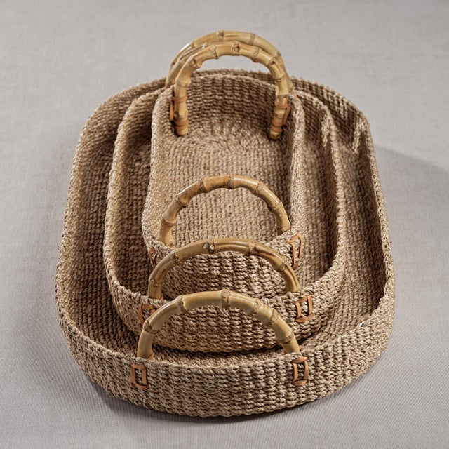 This stunning tray is made from abaca with curved bamboo handles. The natural design exudes coastal and global vibes,...