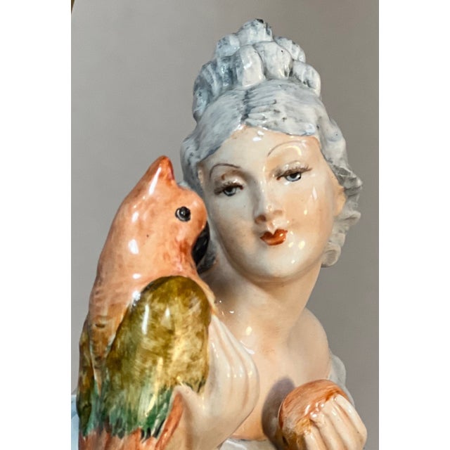 This impressive large porcelain figural lamp was modeled by the Italian sculptor Arturo Pannunzio, whose molded signature...