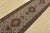 A traditional Tabriz Mahi runner hand-knotted with fine wool on a cotton foundation. This intricately woven oriental rug...