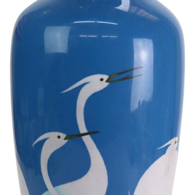 JCB Enameled Copper Floor Vase With Herons C1920 Measures - 23 3/4" x 9 1/2" x 9 1/2" An enameled copper floor vase...