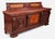 An impressive architectural statement, this monumental 20th-century credenza combines richly carved ornament with luminous...