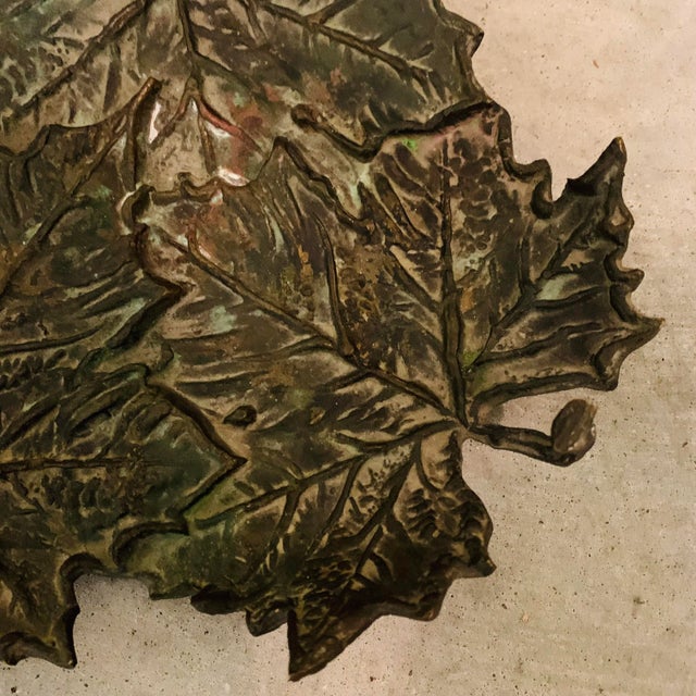 Vintage cast metal maple leaf tray. Unmarked. Measures roughly 9" x 9"x 3". Weighs over 3 pounds.