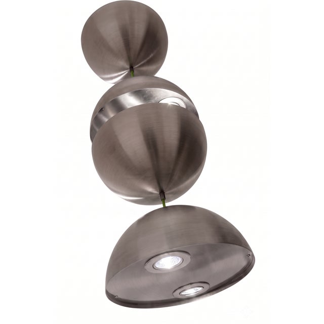 Conceptual inspiration: cosmic aesthetics and the collision of light "stratosferico" is a suspended lighting sculpture...