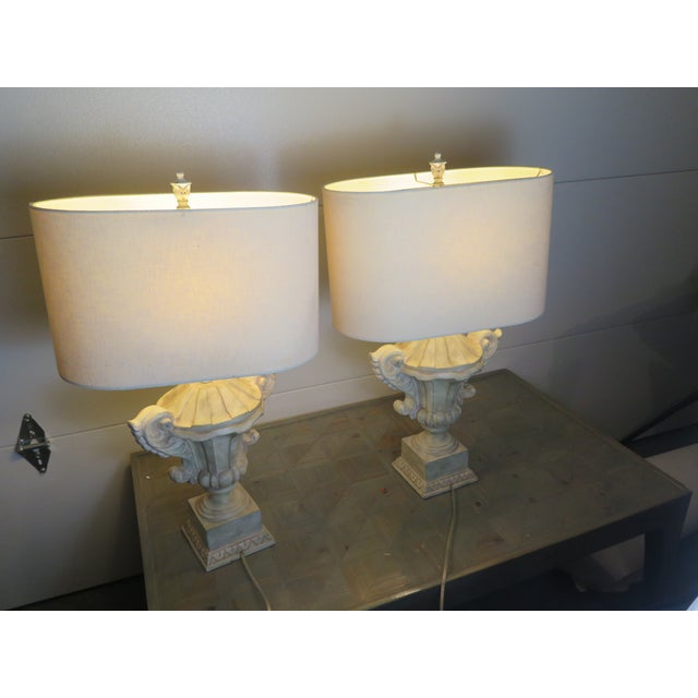 These lamps appear to be concrete molded lamps in a gray shade, but it is man made material that comes from a mold that...