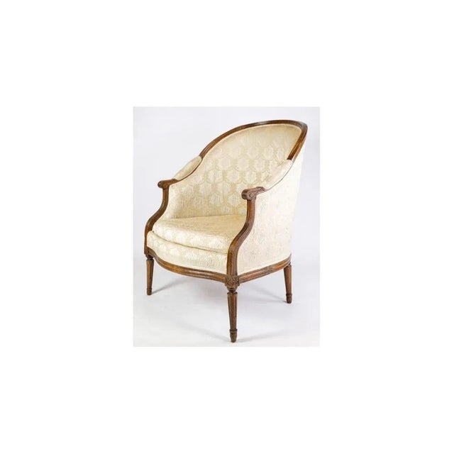 A set of two louis seize chairs in polished mahogany with brightly decorated fabric from the 1880s. In very good...