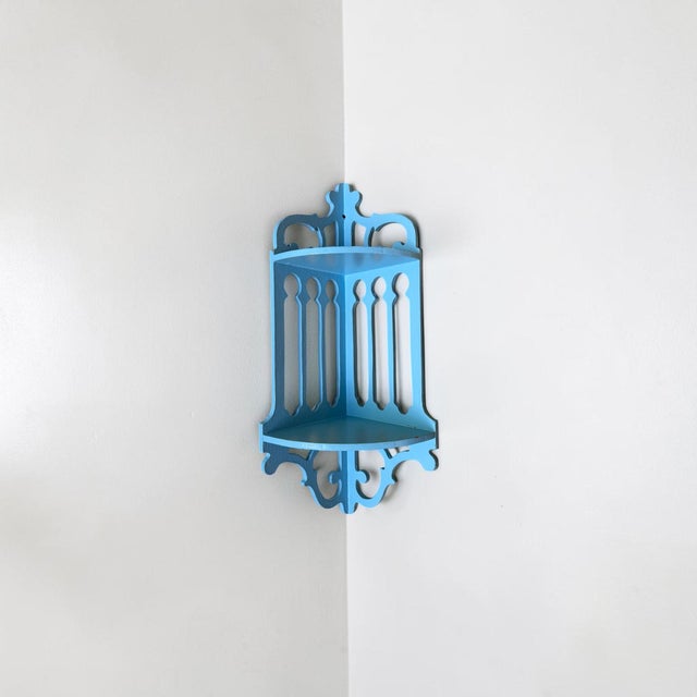 Add a pop of character to an empty corner with this charming mid-20th-century wooden corner shelf. Featuring classic...