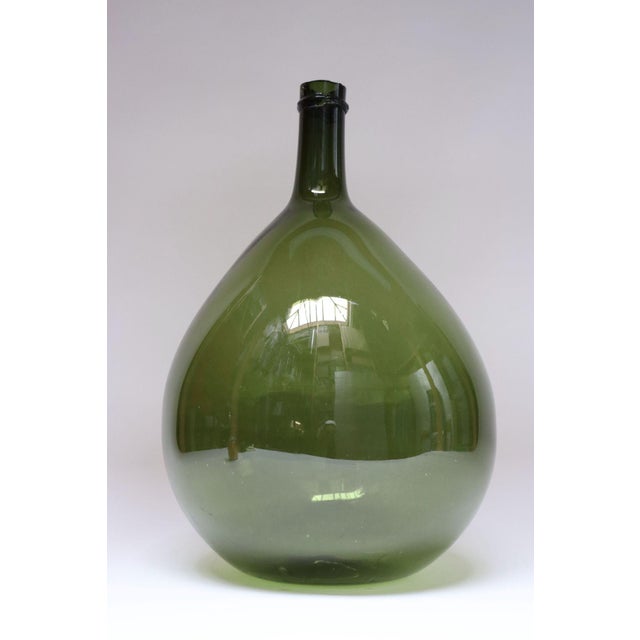 Italian Demijohn / Carboy originally used for transporting wine (ca. early 20th Century, Italy). Composed of attractive...