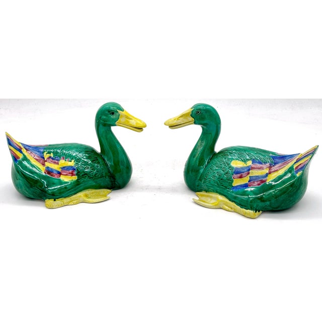 Pair of Chinese Sancai Glazed Seated Ducks—20th Century Dimensions (Each Duck): 9” W x 6” H x 5” D This stunning pair of...