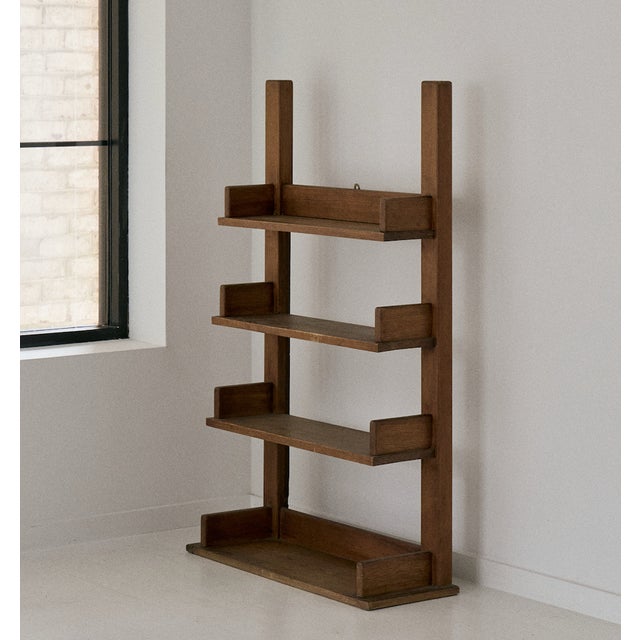 Vintage French wooden shelf. This bookcase features four (4) shelves that are perfect for either functional book storage...