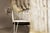 A highly distinctive set of four sculptural wrought iron garden lounge chairs, most likely French and dating to the...
