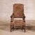This 18th Century English Walnut Armchair is a refined antique that exemplifies the elegance and craftsmanship of English...