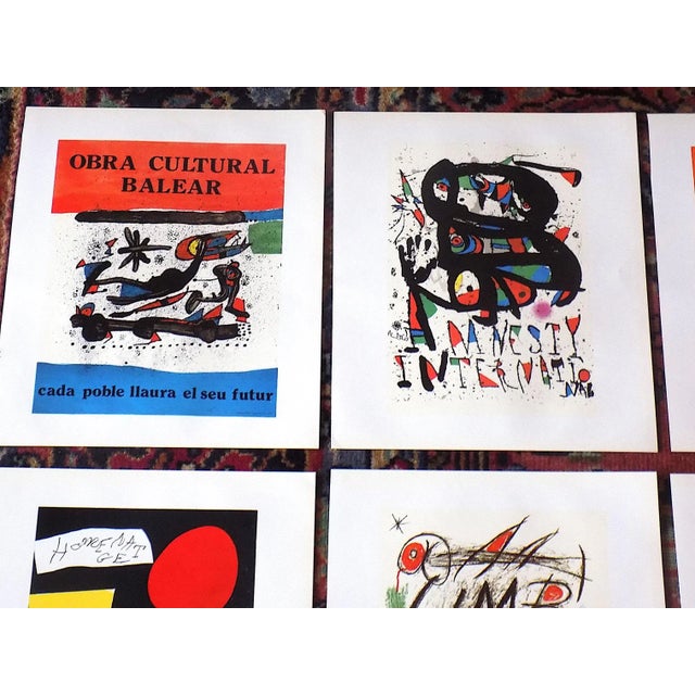This set of nine (9) color lithographs (offset) by Joan Miro (Spain, France 1893-1983) was pulled from a vintage 20th...