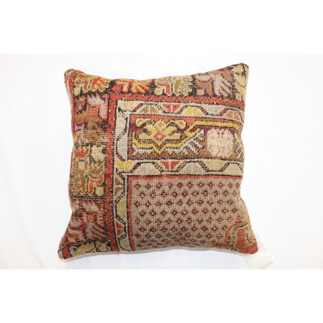 Pillow made from an early 20th century turkish rug. Measures: 17'' x 17''