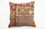 Pillow made from an early 20th century turkish rug. Measures: 17'' x 17''