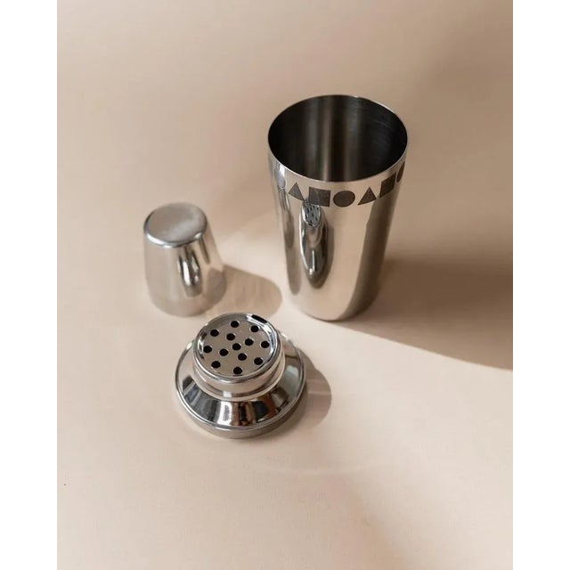 This vintage cocktail mixer from 1980s Italy is a timeless bar accessory crafted from polished stainless steel. Decorated...