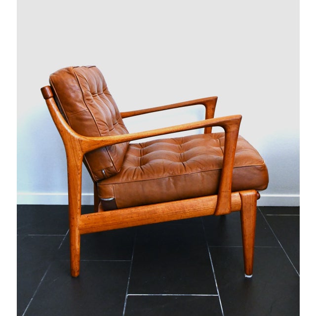 Pair Swedish Teak Armchairs, model Kuba, designed by Bertil Fridhagen, for Bröderna Andersson 1950´s. This pair has brown...