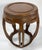 Vintage Asian wood garden stool circa 1960s. Features carved Greek Key pattern around top edge of seat with five carved...