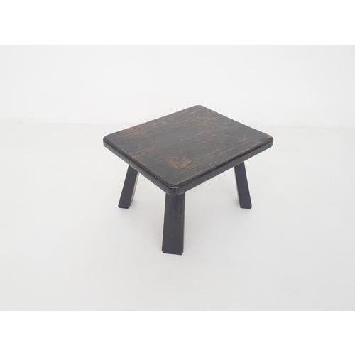 Heavy wooden side table with a beautiful patina.