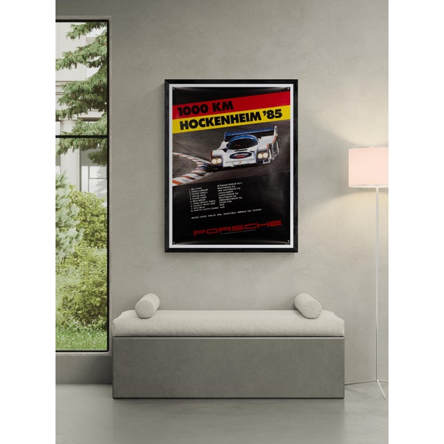 An original 1985 porsche motorsport poster celebrating the 1000km hockenheim race. Designed by gruppe c with photography...