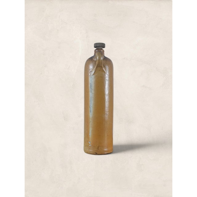Antique Dutch Stoneware Gin Bottle. Long before gin took over cocktail menus, there was genever, the Dutch original, and...
