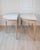 An elegant pair of Swedish demi-lune console tables in oak, dating to the mid-19th century. Each table features a graceful...