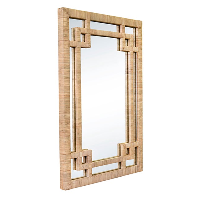 New item. Not vintage. Add a touch of whimsy to your decor with our Geneva Natural Rattan Framed Mirror. The unique Greek...