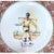 Vintage porcelain Old Trades plate featuring a vegetable merchant. Acanthus leaf motiff around perimeter. Marked "Les...