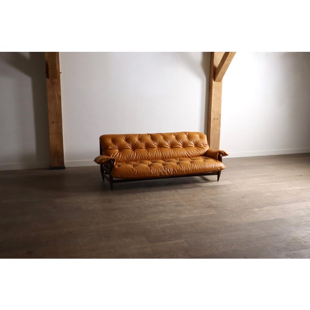 Rodeio sofa, designed by Jean Gillon and manufactured by Italma Wood Art in Brazil in 1965. The sofa is built around a...