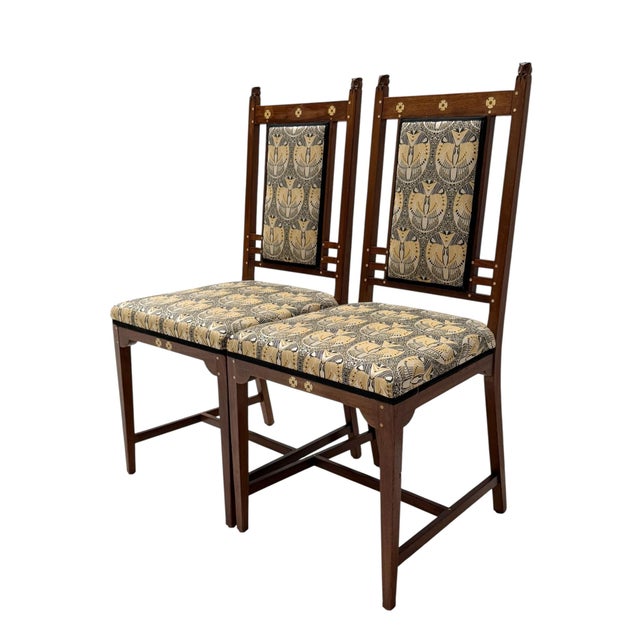 Magnificent and rare pair of Arts & Crafts side chairs. Design by the famous Dutch furniture company Onder den Sint...