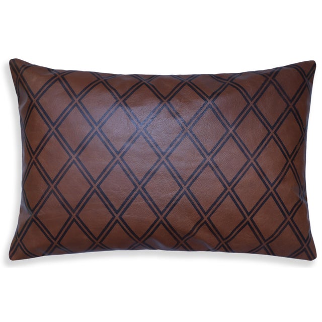 Bring timeless sophistication to your home with this 16 x 24 inch handcrafted leather lumbar pillow, where contemporary...