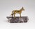 This example of streamlined Mid Century Modern design captivates with its flowing silhouette and the warm glow of solid...