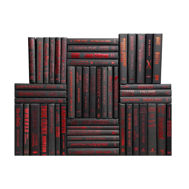 The Modern Black & Red Accent Book Wall features fifty contemporary books in bold and sophisticated shades of black and...