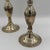 Classic, elegant, and beautifully proportioned, this pair of sterling silver three-arm candelabra were made by Duchin...