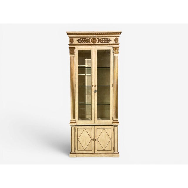 French Neoclassical, Monumental Biblotheques, Cream Painted Wood, Gilt, France, 19th/20th c. Pair of highly impressive...