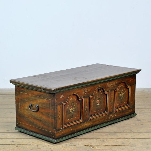 German pine bridal chest made in 1826 for a certain Jacob Sallberger. Hand-painted with beautiful fine details. The iron...