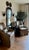 Verellen Pair of Taupe Leather, Skirted Slip-Covered Verellen Chairs on Casters For Sale - Image 4 of 14